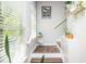 Inviting entryway with a staircase, decor, and natural light through a window at 1112 Park S Row, Atlanta, GA 30312