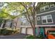 Desirable townhome exterior with two-car garage, modern facade, and inviting curb appeal at 1112 Park S Row, Atlanta, GA 30312