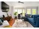 Bright living room boasts a comfortable sofa, modern decor, and abundant natural light at 1112 Park S Row, Atlanta, GA 30312