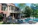 Back exterior with a pool, spa, and stone outdoor kitchen, complete with a cozy screened-in porch at 2698 Bonar Hall Path, Duluth, GA 30097