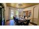 Formal dining room with chandelier lighting and large windows at 2698 Bonar Hall Path, Duluth, GA 30097