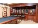 Elegant game room with pool table, bar, and lighting offers an inviting space for relaxation and entertainment at 2698 Bonar Hall Path, Duluth, GA 30097