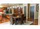Gourmet kitchen with custom cabinetry, stainless steel appliances, and center island with seating at 2698 Bonar Hall Path, Duluth, GA 30097