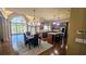 Open concept kitchen with a large island and breakfast nook with backyard views at 2698 Bonar Hall Path, Duluth, GA 30097