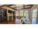 Spacious living room with fireplace, built-ins, and lots of natural light at 2698 Bonar Hall Path, Duluth, GA 30097