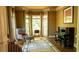 Comfortable sitting area with bay window, piano and patterned rug at 2698 Bonar Hall Path, Duluth, GA 30097