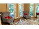 Cozy sitting area with large windows and comfortable seating at 2698 Bonar Hall Path, Duluth, GA 30097