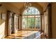 Bright sunroom with hardwood floors, large windows, and natural light at 2698 Bonar Hall Path, Duluth, GA 30097