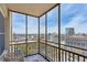 City view from covered balcony, perfect for relaxing or entertaining at 300 Peachtree Ne St # 19B, Atlanta, GA 30308