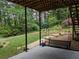 Relax on the patio swing and enjoy the peace and quiet of this landscaped backyard at 1673 Chadwick Ridge Dr, Lawrenceville, GA 30043