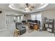 Open basement space with carpet flooring, drop ceiling, office area, and recessed lighting at 1673 Chadwick Ridge Dr, Lawrenceville, GA 30043