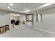 Partially finished basement boasts recreation space and wet bar with mini fridge for entertaining at 1673 Chadwick Ridge Dr, Lawrenceville, GA 30043