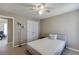 Bedroom features a comfortable bed, carpet flooring, and a double door closet at 1673 Chadwick Ridge Dr, Lawrenceville, GA 30043