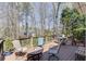 Outdoor deck with seating offers a tranquil space for entertaining or unwinding at 1673 Chadwick Ridge Dr, Lawrenceville, GA 30043