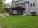 A well-manicured lawn and landscaped backyard add to the curb appeal of this lovely home at 1673 Chadwick Ridge Dr, Lawrenceville, GA 30043