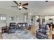 Open floor plan showcasing the living room with hardwood floors and a cozy aesthetic at 1673 Chadwick Ridge Dr, Lawrenceville, GA 30043