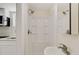Updated bathroom with corner shower and faucet, tiled walls, and modern sink and faucet at 6370 Boca Grande Blvd, Forest Park, GA 30297