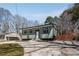 Well-kept home with a spacious driveway and manicured lawn at 6370 Boca Grande Blvd, Forest Park, GA 30297