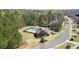 An aerial view of the community pool and clubhouse area, providing a glimpse of the neighborhood's amenities at 6825 Concord Brook Ln, Cumming, GA 30028