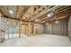 Unfinished basement featuring exposed ceiling insulation and framing for future build-out and customization at 6825 Concord Brook Ln, Cumming, GA 30028