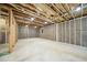 Large unfinished basement with visible framing, insulation, and concrete floor, ready for customization at 6825 Concord Brook Ln, Cumming, GA 30028