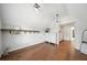 Bright bonus room with wood floors and a large dresser provides lots of storage at 6825 Concord Brook Ln, Cumming, GA 30028