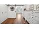 Bonus room features a sliding barn door and a large dresser with plenty of storage at 6825 Concord Brook Ln, Cumming, GA 30028