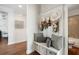 Charming entryway with decorative bench seating, storage, and stylish decor, creating a welcoming and organized space at 6825 Concord Brook Ln, Cumming, GA 30028