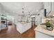 Spacious kitchen with a center island, stainless steel appliances, and an open floor plan at 6825 Concord Brook Ln, Cumming, GA 30028