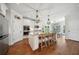 Bright kitchen featuring a large island, stainless steel appliances, and pendant lighting at 6825 Concord Brook Ln, Cumming, GA 30028