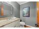 Updated bathroom featuring granite countertop, modern faucet, and a neutral color scheme at 2115 Hawthorne Pt, Marietta, GA 30062