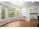 Cozy breakfast nook with large windows, hardwood floors and a view of the outdoors at 2115 Hawthorne Pt, Marietta, GA 30062