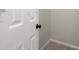 Close up of a doorway showing door hardware and trim at 2115 Hawthorne Pt, Marietta, GA 30062