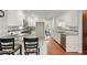 Bright kitchen with granite countertops, stainless appliances, and hardwood floors at 2115 Hawthorne Pt, Marietta, GA 30062