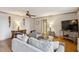 Cozy living room featuring parquet floors, stylish decor, and a comfortable seating area at 300 Peachtree Ne St # 18I, Atlanta, GA 30308