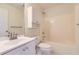 Well-maintained bathroom with a shower-tub combo and vanity sink at 534 Creekstone Dr, Jonesboro, GA 30236