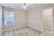 Comfortable bedroom featuring a ceiling fan and plenty of natural light at 534 Creekstone Dr, Jonesboro, GA 30236