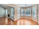 Sunlit breakfast area with fireplace and access to outdoor patio at 534 Creekstone Dr, Jonesboro, GA 30236