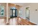 Elegant foyer with hardwood floors, a grand entrance door, and a view into the adjacent living spaces at 534 Creekstone Dr, Jonesboro, GA 30236