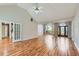 Spacious living room with hardwood floors, high ceilings, and a view of the front entrance at 534 Creekstone Dr, Jonesboro, GA 30236