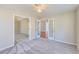 Office/Flex room with French doors and neutral decor at 534 Creekstone Dr, Jonesboro, GA 30236