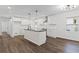 Modern kitchen features white cabinetry, stainless steel appliances, and a functional center island at 175 Holly Nw Rd, Atlanta, GA 30314