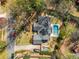 Aerial view showcasing the backyard pool, surrounding greenery, and the layout of the property at 570 Glen Eagles Se Cir, Marietta, GA 30067