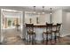 A stylish bar area with pendant lighting and comfortable seating, ideal for entertaining guests and relaxing at 570 Glen Eagles Se Cir, Marietta, GA 30067