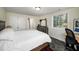 Bright bedroom with a large window, ample closet space, and rustic decor, perfect for relaxation at 570 Glen Eagles Se Cir, Marietta, GA 30067