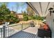 Outdoor deck featuring a grill, seating, and a view of the backyard and in-ground pool at 570 Glen Eagles Se Cir, Marietta, GA 30067