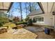 Manicured front yard landscaping and exterior view of home with a stone walkway at 570 Glen Eagles Se Cir, Marietta, GA 30067