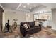 An open-concept living area with a tile floor and bar area, perfect for entertaining and relaxing at 570 Glen Eagles Se Cir, Marietta, GA 30067