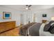 Relaxing main bedroom featuring wood floors, lots of natural light, and generous closet space at 570 Glen Eagles Se Cir, Marietta, GA 30067