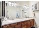 Bathroom features a double sink vanity and tile floors at 12551 Alcovy Rd, Covington, GA 30014
